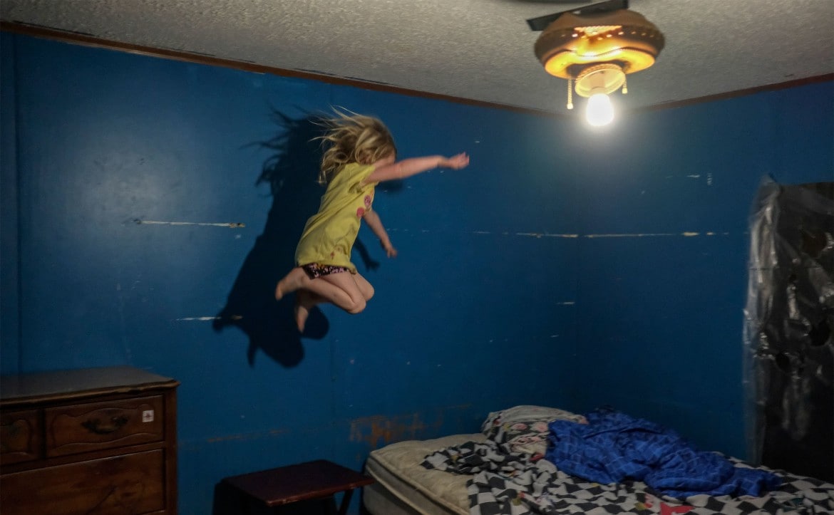 JumpingToFromBedLittleGIrl.jpeg